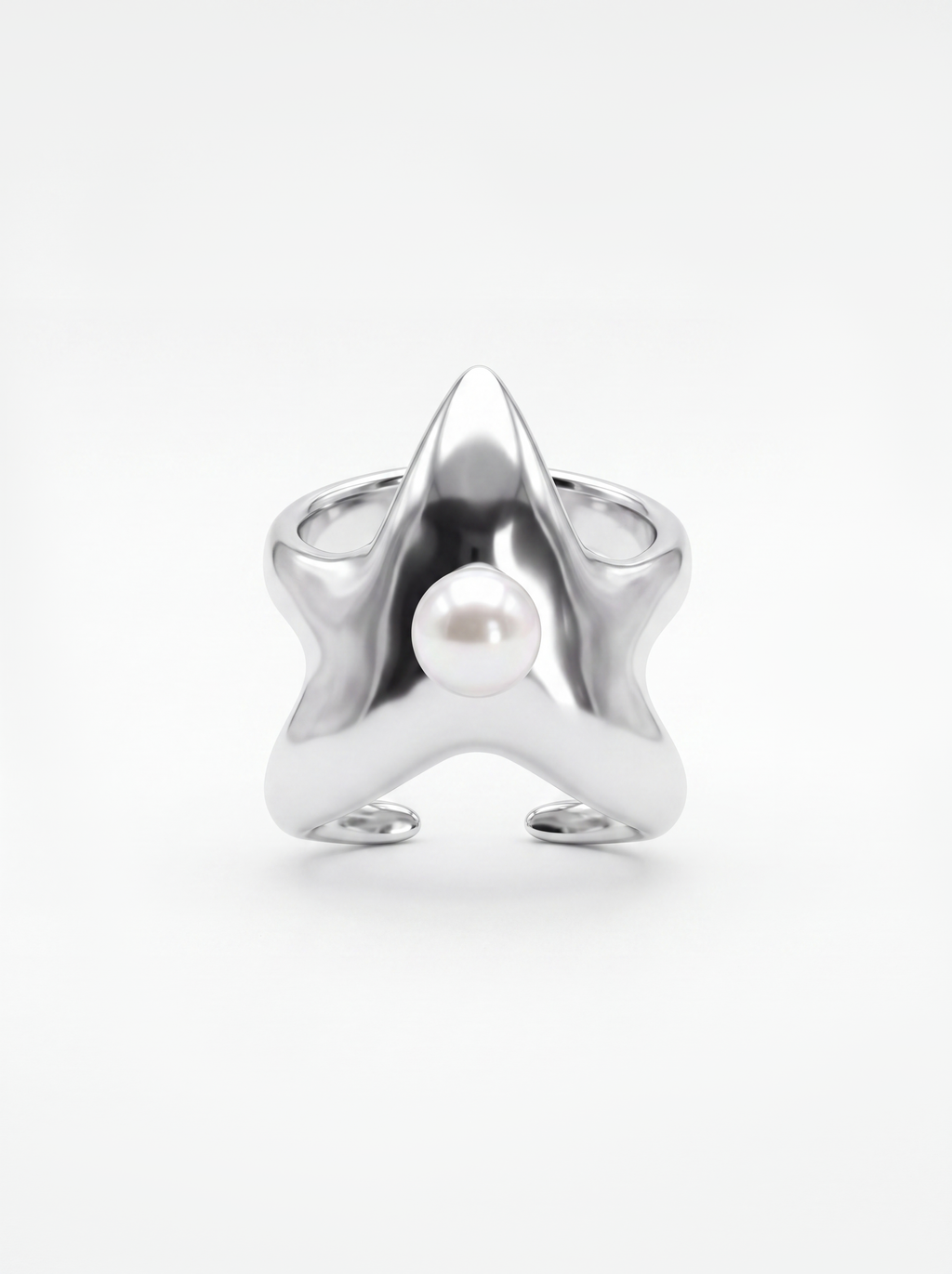 A polished white gold cuff shaped like a five-pointed star, featuring a white pearl set in the center, photographed on a seamless white background.