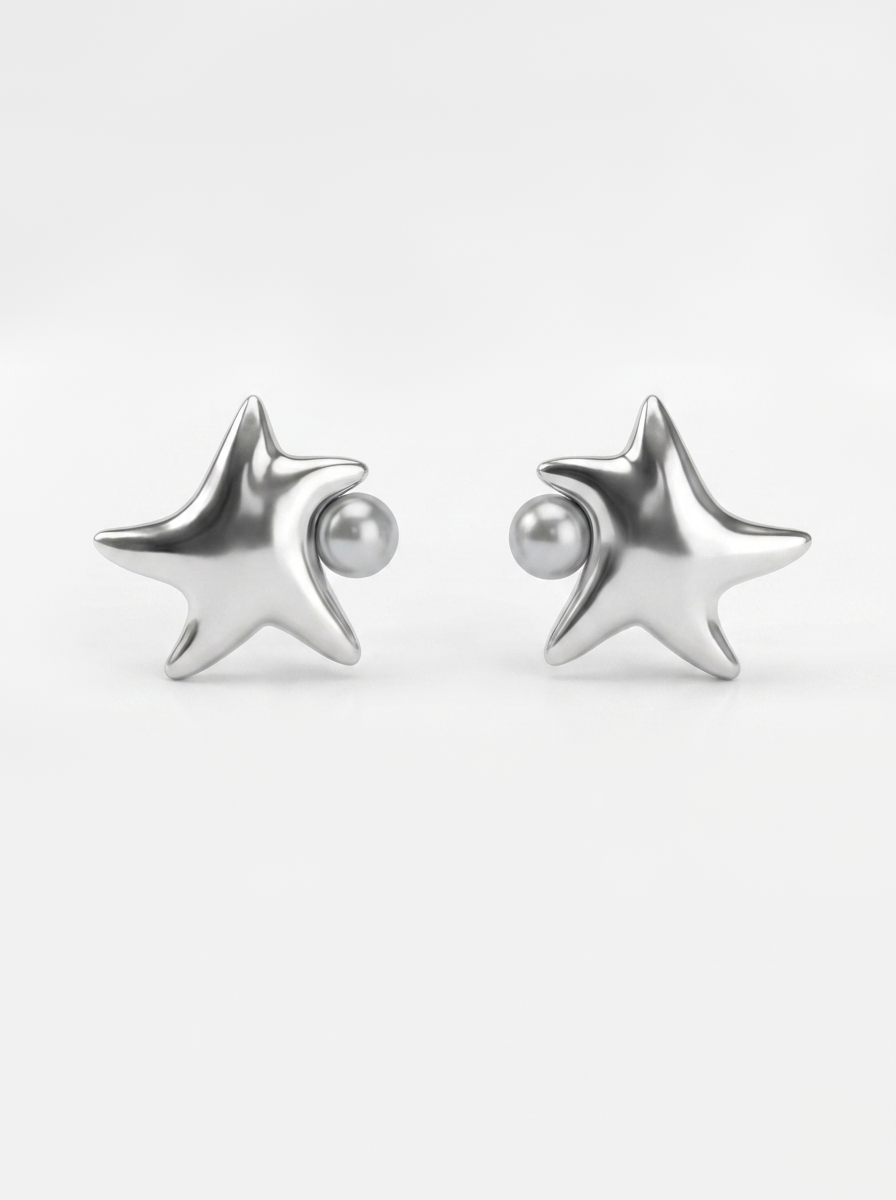 A pair of white gold star-shaped stud earrings with a small round pearl inset on each earring, shown against a clean white background.